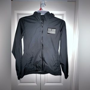 Nike black golf jacket storm-fit SMALL with American Flag patch great condition